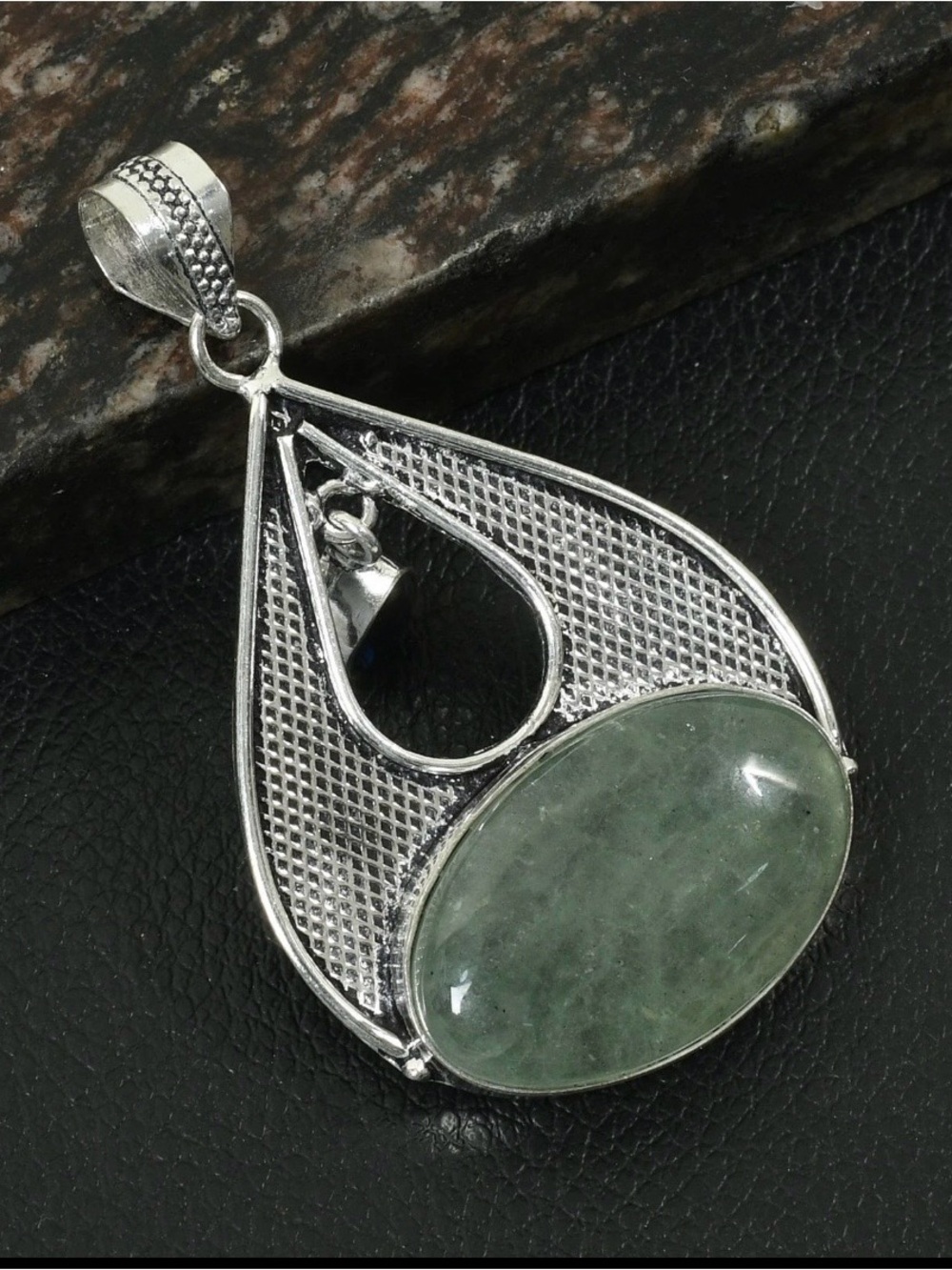 Hand Crafted Silver Teardrop Pendant with Green Oval Gem